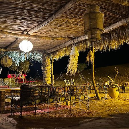 Sahara Majestic Luxury Camp Hotel Merzouga Luaran gambar The interior of a desert camp